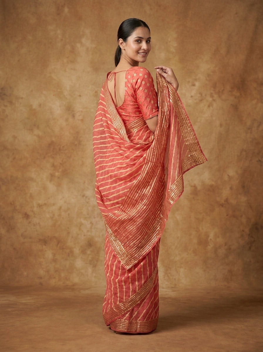 Coral Peach Leheriya Modal Silk Saree for Women with Zari Border & Blouse Piece