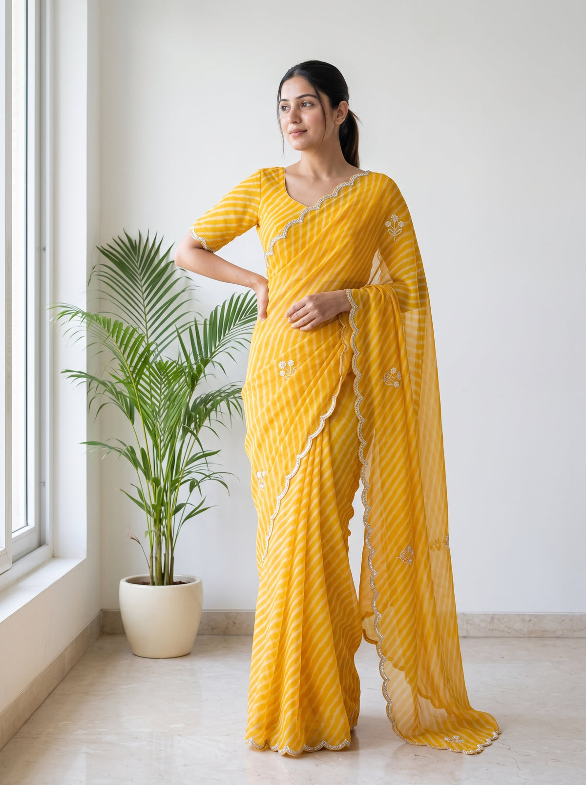 Yellow Leheriya Georgette Saree with Pearl Work & Blouse Piece