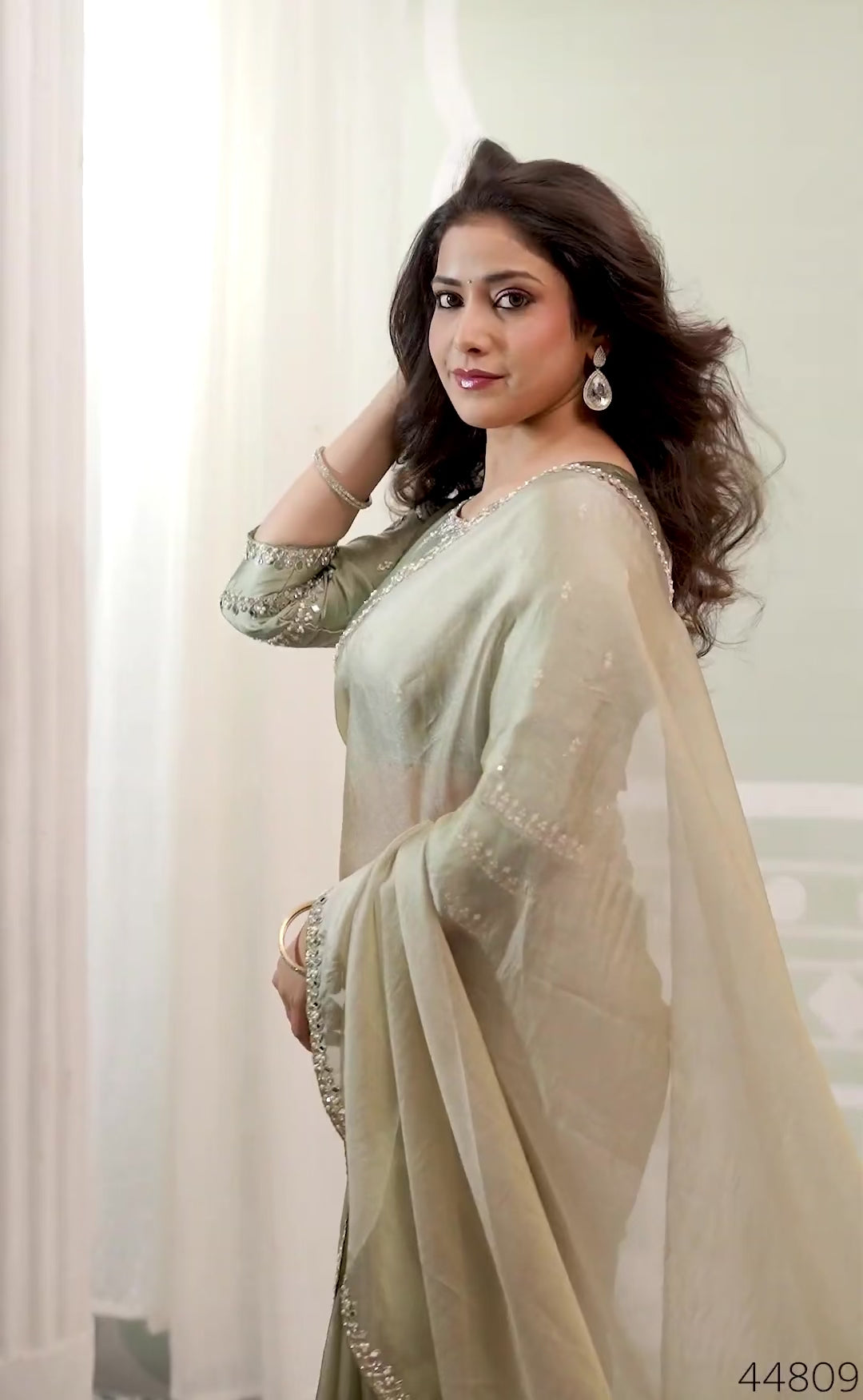Sage Green Tissue Saree with Embellished Border and Matching Blouse